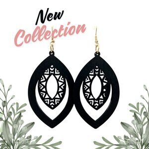 Wooden, black teardrop shaped earrings with geometric detailing